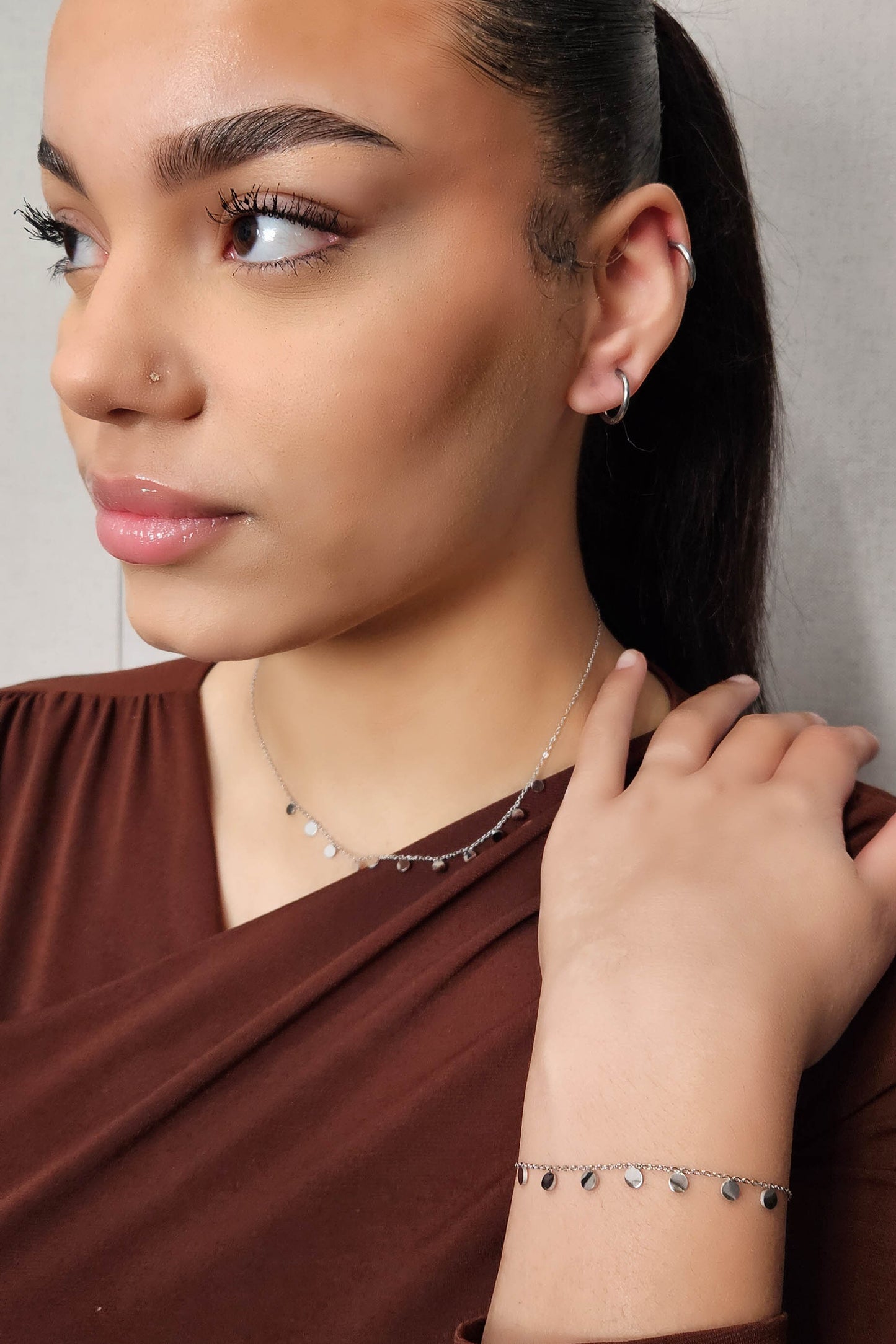 Cadena de acero inoxidable multimonedas plateada