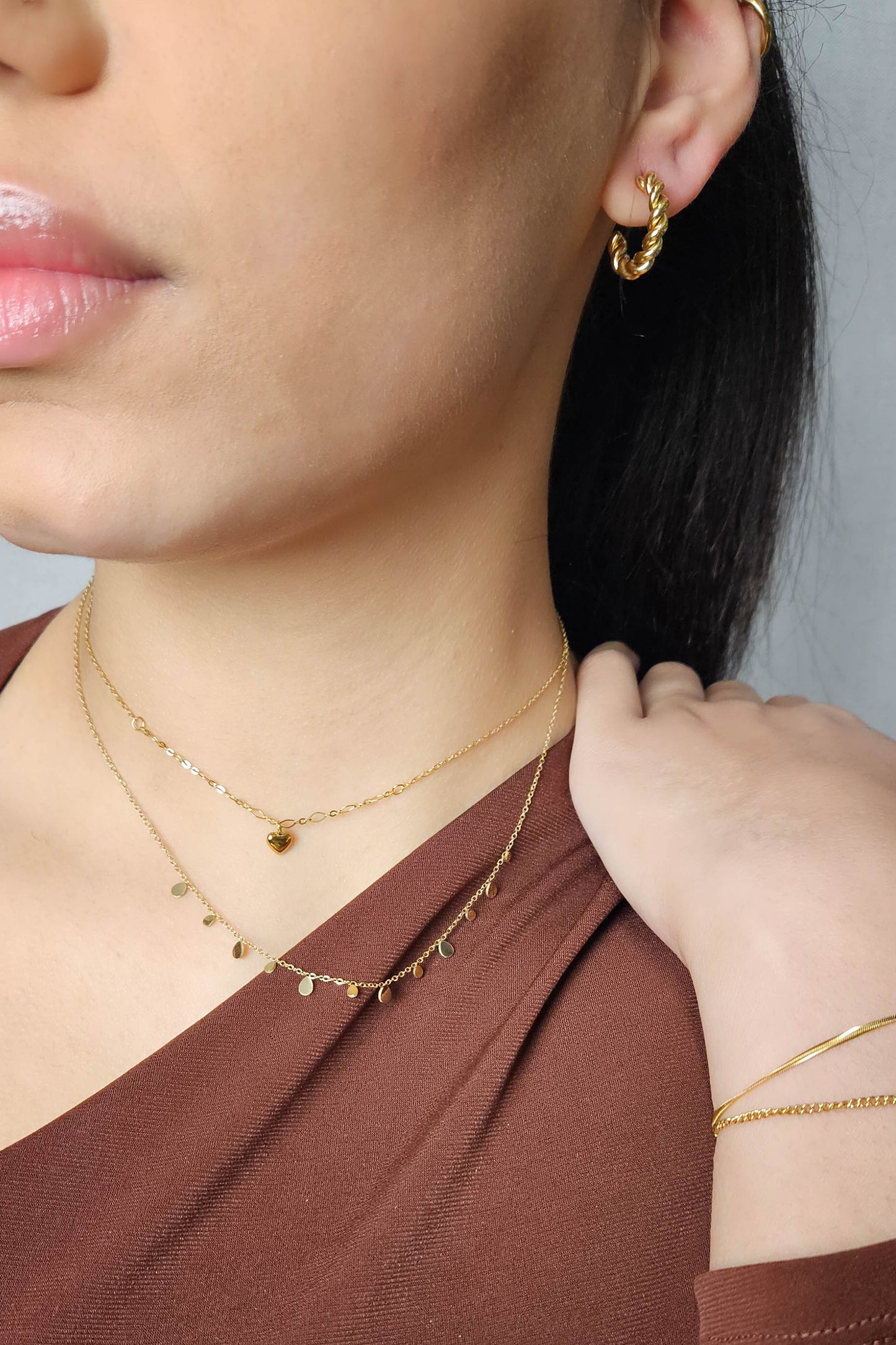 Collar de acero inoxidable con cadena de corazón dorado